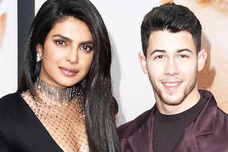 Priyanka Chopra says, "Nick And I Are Expecting" Nick reacts to his wife's statement