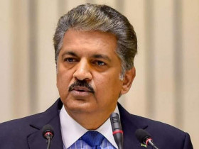 Anand Mahindra replies to a 4-decade-old picture of a girl with a Mahindra car, catch details